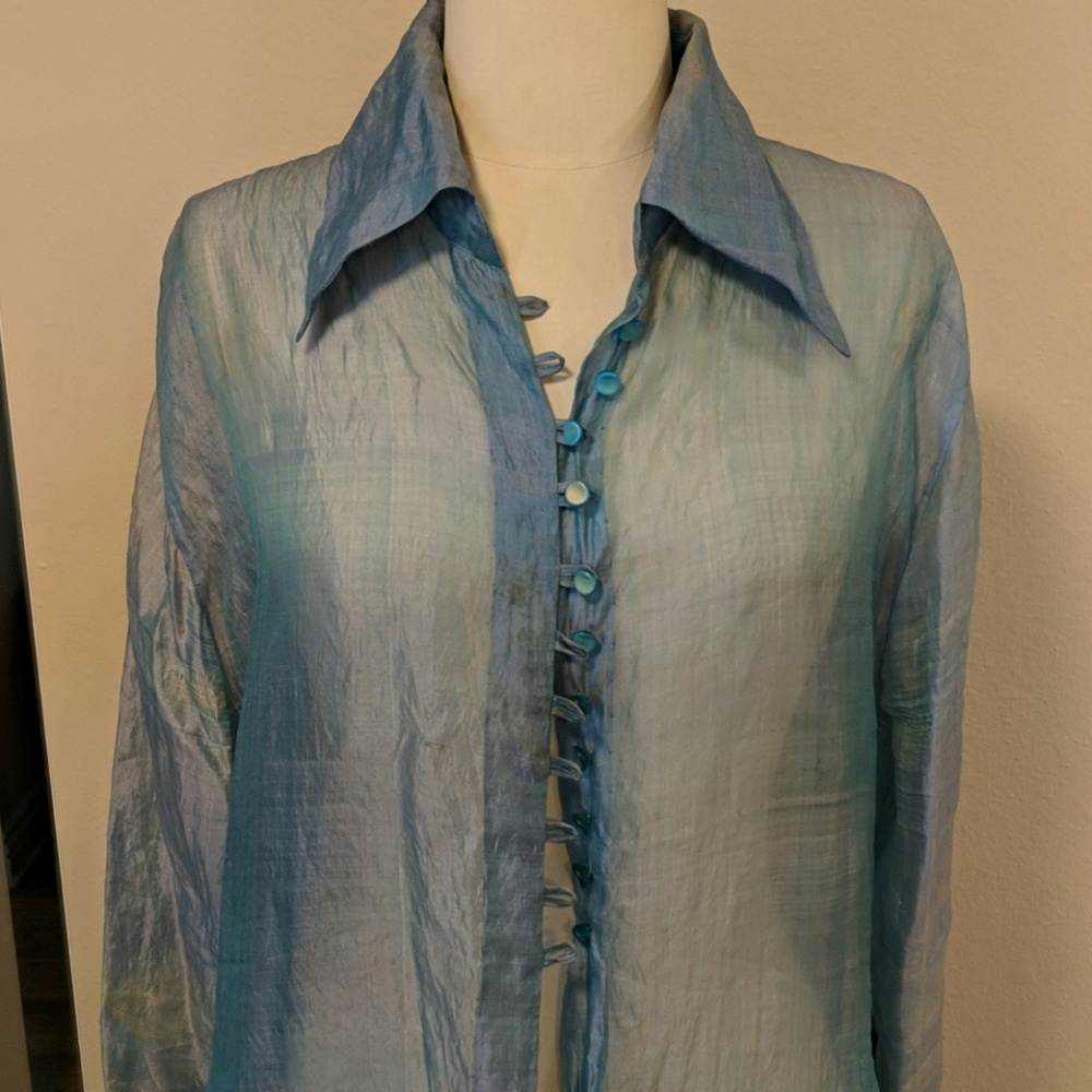 Long sheer blueish over shirt/coat